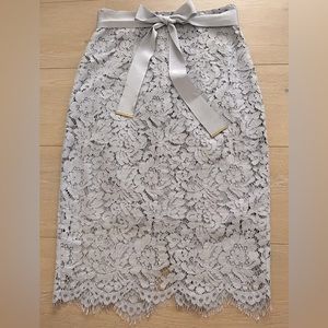 Elegant light blue lace pencil skirt with ribbon